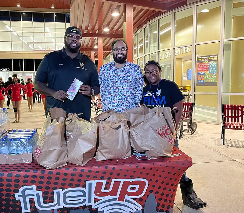 Houston Businesses Giving Back - Turkey drive at Yates HS
